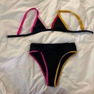 *high waisted* Medium. Black with pinks red and yellow.